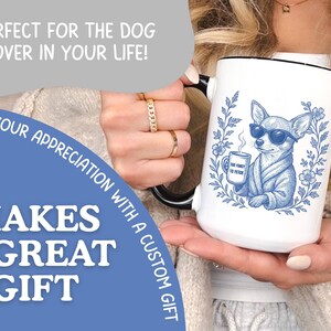May include: White ceramic mug with a black rim and handle, featuring a blue illustration of a chihuahua wearing sunglasses and a robe, holding a mug. The mug has the text "The Fancy to Fetch". The image also includes the text "Makes a Great Gift".