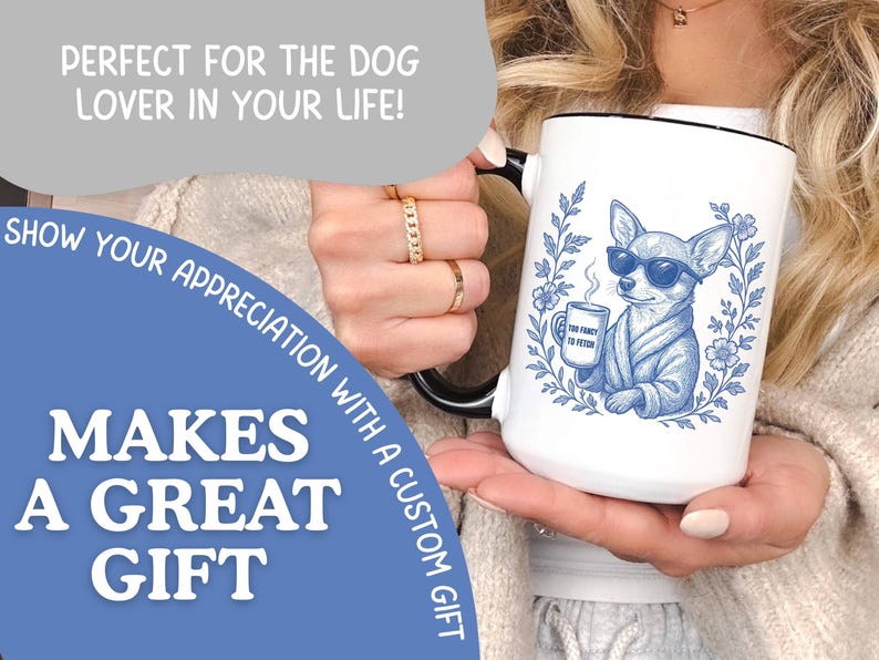 May include: White ceramic mug with a black rim and handle, featuring a blue illustration of a chihuahua wearing sunglasses and a robe, holding a mug. The mug has the text "The Fancy to Fetch". The image also includes the text "Makes a Great Gift".