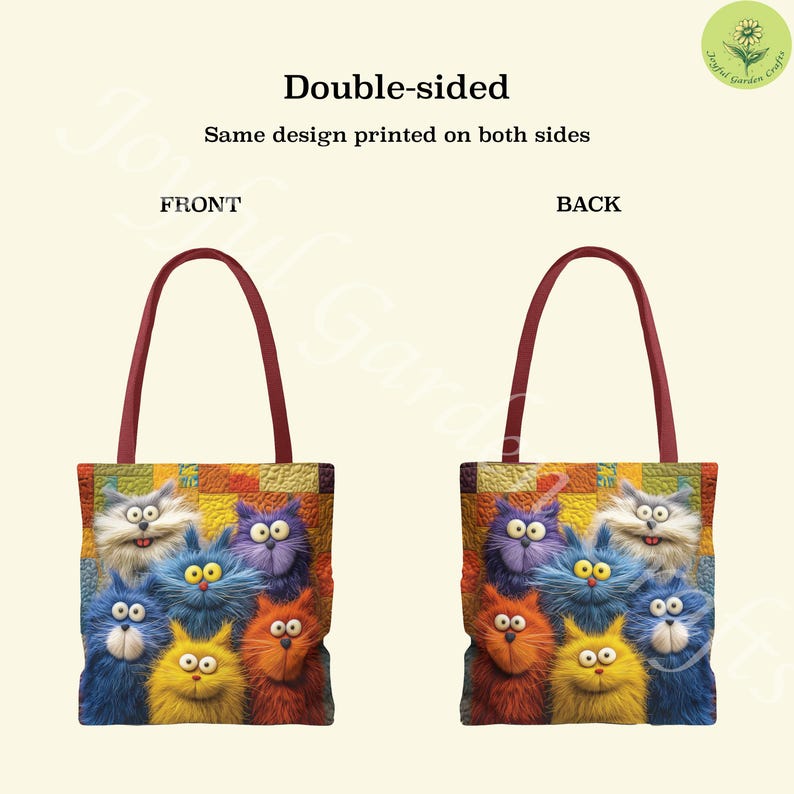 May include: Double-sided tote bag featuring a colorful design of cartoon cats. The bag has a burgundy handle and the same design is printed on both sides. The cats are in various colors, including blue, orange, purple, and yellow.