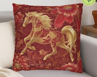 May include: Red decorative throw pillow featuring a golden horse design amidst floral patterns. The horse is depicted in a running pose, with intricate details. The pillow is placed on a gray sofa, showcasing a blend of art and home decor.