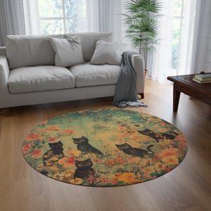 May include: A round rug with a floral pattern and five black cats. The rug has a light green background with pink, yellow, and orange flowers. The cats are all looking at the camera.