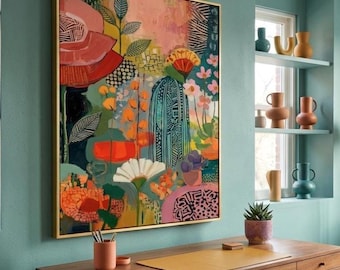 May include: A rectangular wall art piece in a gold frame featuring a vibrant, abstract floral composition with layered shapes in shades of pink, orange, teal, and white, displayed above a wooden desk with a matching pink pencil holder.