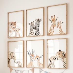 Neutral safari nursery decor with baby animal illustrations.