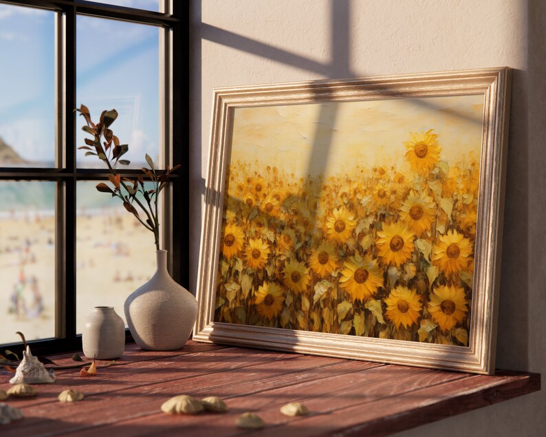 May include: A framed painting of a field of sunflowers in shades of yellow and gold. The sunflowers are in various stages of bloom, with some facing the viewer and others facing away. The background is a soft, hazy yellow.