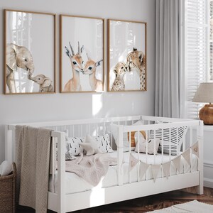 Set of six safari animal artworks for nursery decoration.