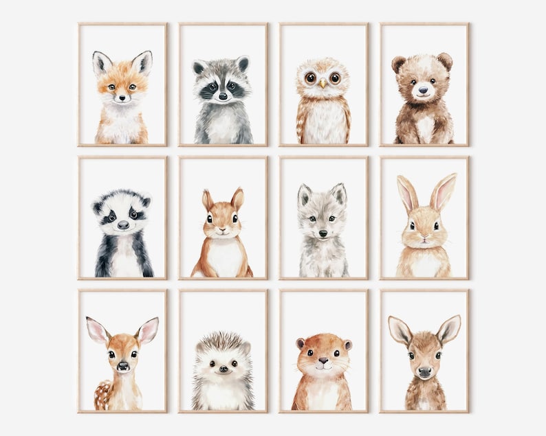 May include: A collection of twelve framed watercolor prints featuring various woodland animals. The animals include a fox, raccoon, owl, bear, badger, squirrel, wolf, rabbit, deer, hedgehog, otter, and another deer. Each print has a light brown frame.