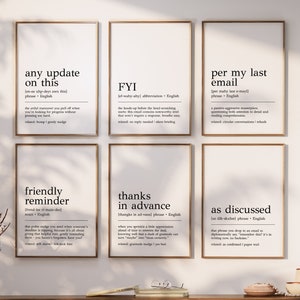 May include: Six printable wall art prints with black text on a white background. Each print features a common office phrase defined as a noun or verb. The phrases are "any update on this", "FYI", "per my last email", "friendly reminder", "thanks in advance", and "as discussed".