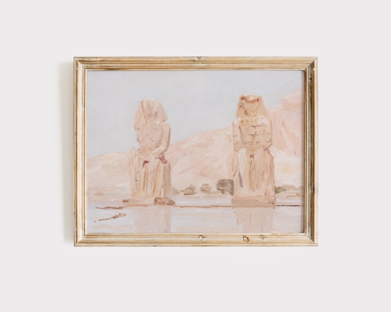 Puede incluir: Una pintura de dos grandes estatuas de piedra en un paisaje des&eacute;rtico. Las estatuas son de color marr&oacute;n claro y parecen ser de origen egipcio antiguo. El fondo es de un rosa y un azul suave y apagado.