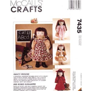 May include: McCall's Crafts pattern for Emma doll dresses. The pattern includes instructions for various fancy frocks and a coat, fitting 45cm dolls. The cover features doll images in different outfits, with the text "Fancy Frocks".