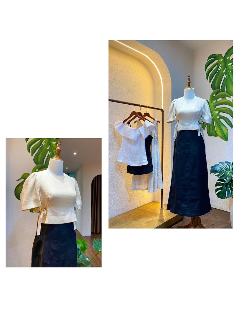 Puede incluir: Dos blusas blancas de lino con mangas abullonadas y un detalle de lazo en la cintura. Una blusa est&aacute; en un maniqu&iacute; y la otra est&aacute; colgada en una percha. Ambas blusas se combinan con faldas negras.