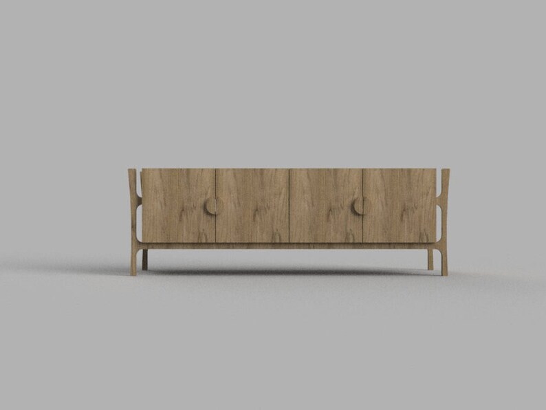 Op de afbeelding: Een houten kast met twee deuren en unieke gebogen poten. De kast heeft een lichtbruine houtkleur.