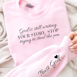 God is Still Writing Your Story Sweatshirt, Trust God Sweatshirt, Women of the Bible Sweatshirt, Inspirational Faith Sweater, Sleeve Design