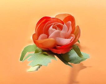 Beautiful orange flower hair clip.