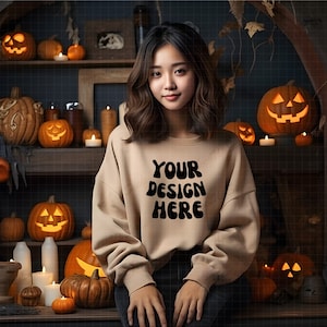 Asian Female Sand Sweatshirt Mockup | Sand Gildan 18000 mockups | Halloween Mocks 18000 | pumpkin light | candles | halloween gift shop