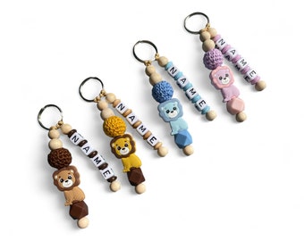 Schlüsselanhänger Löwe mit Namen, Häkelperle,  in den Farben Rosa, Blau, Braun, Hellbraun, Schlüsselanhänger personalisiert