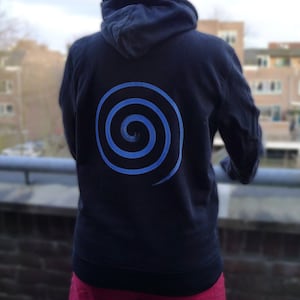 May include: Black hooded sweatshirt with a blue spiral design on the back.