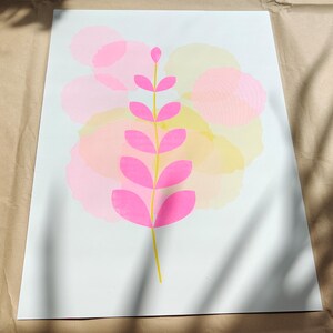 Modern botanical riso illustration in A3 — pink leaves on a yellow stem over layered pastel shapes, limited edition risograph