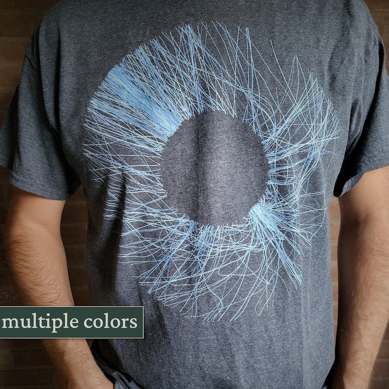 Dark grey heavy cotton t-shirt with an abstract blue radial lines print, minimalist generative sunburst design