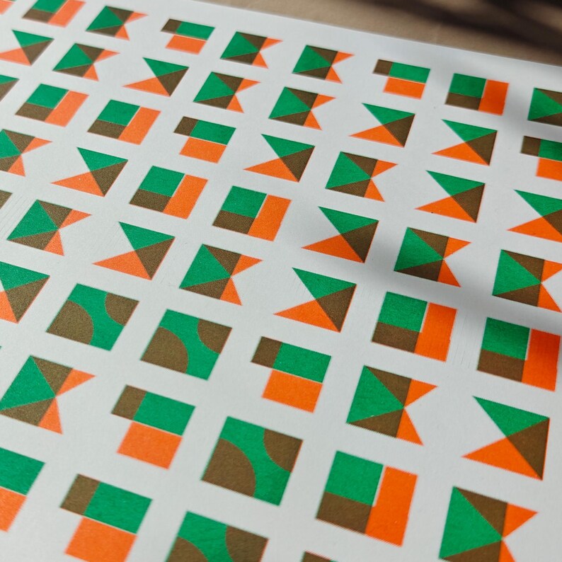 Eco-friendly A3 risograph print with an abstract grid of geometric tiles in green and orange, limited edition gallery art
