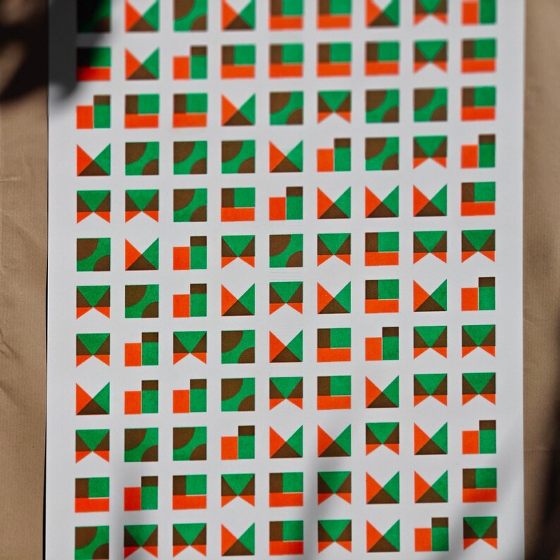 The eco-friendly geometric A3 riso print in green and orange, a signed limited edition art piece