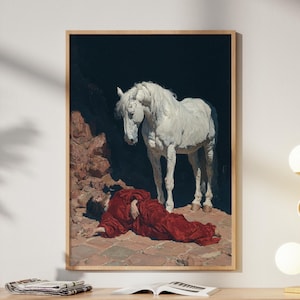 Könnte beinhalten: Ein gerahmter Kunstdruck zeigt ein weißes Pferd und eine Figur in Rot. Das Kunstwerk wird über einem Holzschrank mit einer goldenen Lampe und dekorativen Gegenständen ausgestellt.