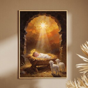 May include: A framed print depicting a baby in a manger, illuminated by a bright star. Two lambs stand nearby. The artwork features warm tones and a golden frame, evoking a sense of peace and reverence. The image is a religious themed artwork.