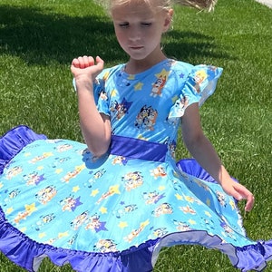 Blue dog and stars bow back twirl dress with shorts