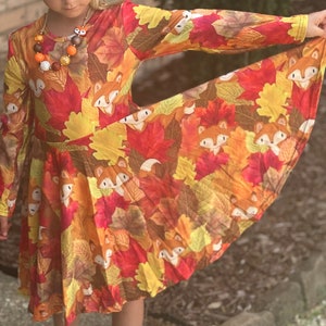 Foxy leaves fall twirl dress