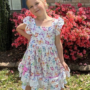 BD Junior B/W Tweed ruffle dress