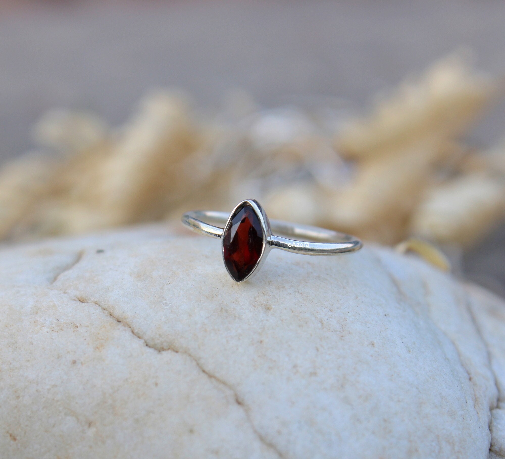Dark red shop stone ring