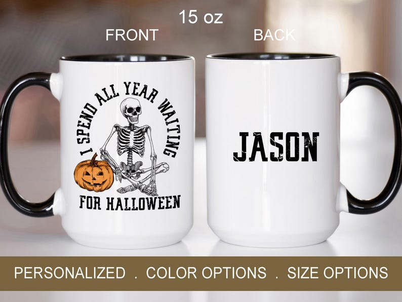 May include: A white ceramic coffee mug with a black rim and handle. The front of the mug features a skeleton holding a pumpkin with the text "I spend all year waiting for Halloween". The back of the mug has the name "Jason" in black text.