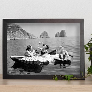 women eating spaghetti, eating pasta on lake, wall art