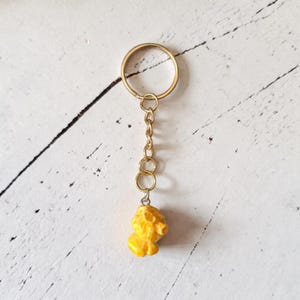 Llavero de palomitas de maíz