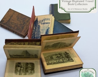 May include: A collection of six miniature vintage travel books, each with a unique cover and illustrations. One book is open, displaying detailed black and white images. The books are in various colors, including brown, red, and blue. The text "NEW YORK ILLUSTRATED" is visible on one book.