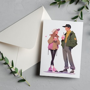 May include: A greeting card with an illustration of two people standing and holding beverages. The woman is wearing a pink hat, a brown jacket, and black pants. The man is wearing a green jacket, a black cap, and gray pants. Both people are smiling and looking at each other.