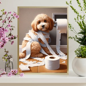 May include: A light brown dog with a white roll of toilet paper wrapped around its body. The dog is sitting on a wooden floor with a roll of toilet paper on the floor next to it.