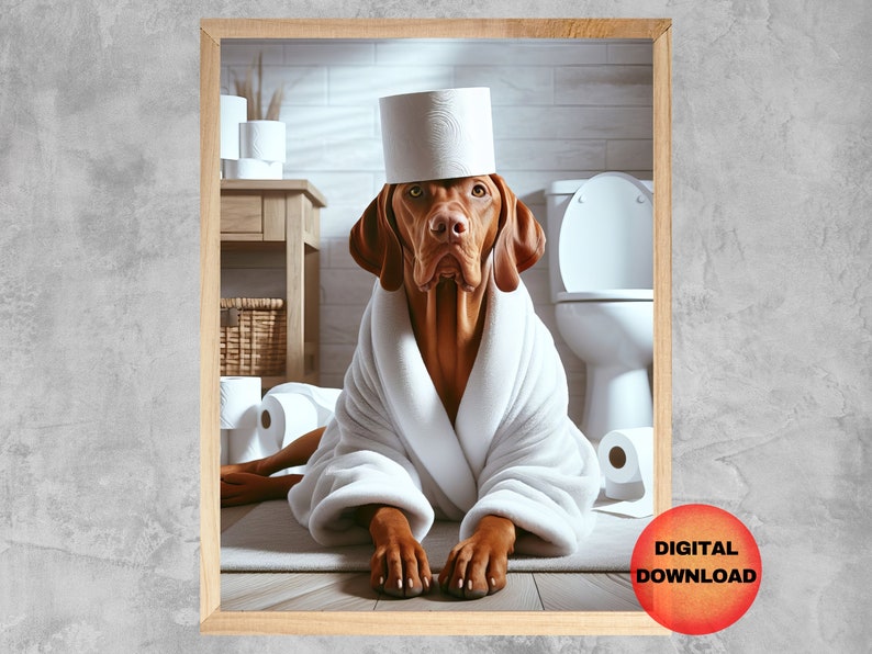 May include: A brown and white dog wearing a white bathrobe and a toilet paper roll hat. The dog is sitting in a bathroom with a toilet and a stack of toilet paper rolls on a shelf.