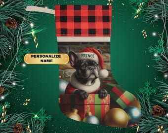 May include: A Christmas stocking with a red and black buffalo plaid cuff. The stocking features a French Bulldog wearing a Santa hat and holding a gift box. The dog's name is "Prince".