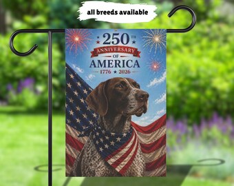 May include: A garden flag featuring a German Shorthaired Pointer dog wearing a bandana with an American flag design. The flag commemorates the 250th anniversary of America, with fireworks and the years 1776-2026.
