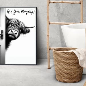 May include: Black and white illustration of a Highland cow peeking around a door with the text "Are You Pooping?" printed above the cow.