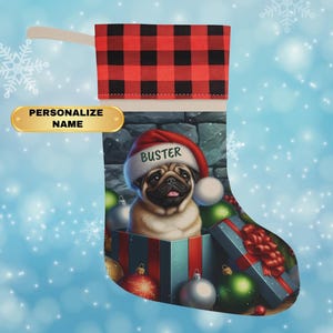 May include: A red and black plaid Christmas stocking with a pug dog wearing a Santa hat and the name "Buster" on it. The pug is sitting in a blue and green gift box with red and green ornaments around it.