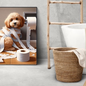 May include: A white fluffy dog is tangled in toilet paper. The dog is sitting on a wooden floor with a roll of toilet paper on the floor next to it. The dog is looking at the camera.