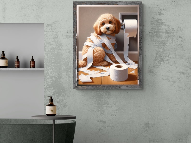 May include: A framed painting of a light brown dog with white fur, sitting on a wooden floor. The dog is tangled in toilet paper, and there is a roll of toilet paper on the wall behind it.