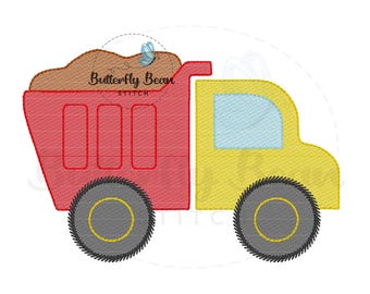 May include: Red and yellow toy dump truck with a brown dirt pile in the bed. The truck has a butterfly sticker on the side and the words "Butterfly Bean Stitch" on the side.