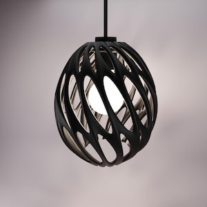 May include: A black, modern pendant light fixture with an open, cage-like design. The light has an oval shape with a series of curved, intersecting lines. A bright light bulb is visible inside the fixture. The fixture hangs from a black cord.