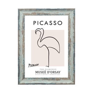May include: A framed print of a black and white line drawing of a flamingo by Pablo Picasso. The print is titled "The Flamingo" and is from the Mus&eacute;e d'Orsay in Paris.