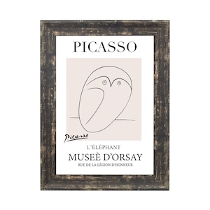 May include: A framed print of a black and white line drawing of an elephant by Pablo Picasso. The print is titled "L'&eacute;l&eacute;phant" and is from the Mus&eacute;e d'Orsay in Paris, France.