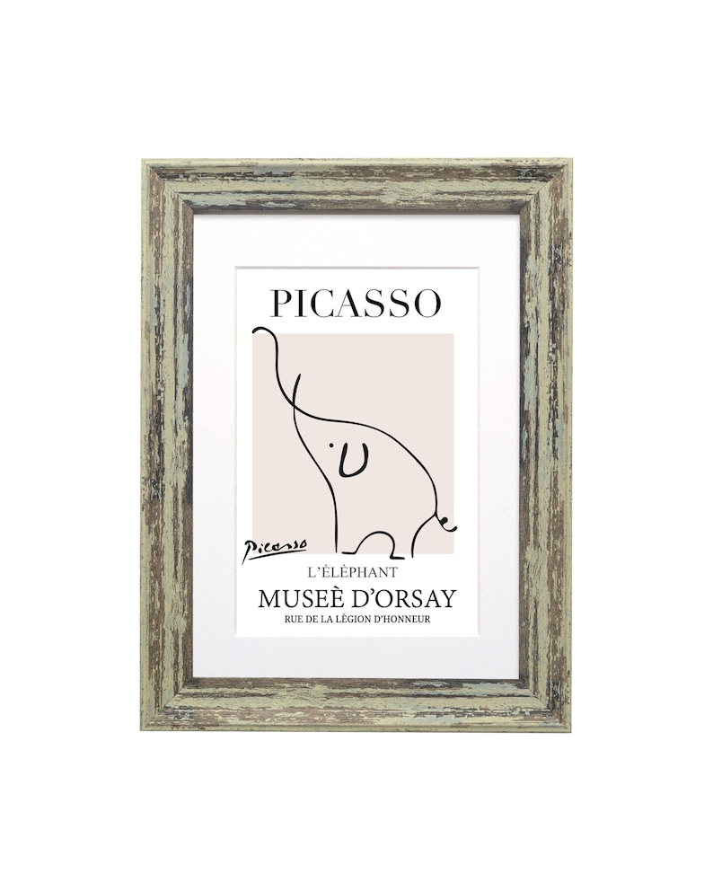 May include: A framed print of a line drawing of an elephant by Pablo Picasso. The print is titled "L'&eacute;l&eacute;phant" and includes the text "Mus&eacute;e d'Orsay" and "Rue de la L&eacute;gion d'honneur".