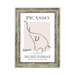 May include: A framed print of a black and white line drawing of an elephant by Pablo Picasso. The print is titled "L'&eacute;l&eacute;phant" and includes the text "Mus&eacute;e d'Orsay" and "Rue de la L&eacute;gion d'Honneur".
