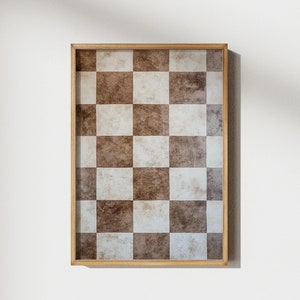 May include: A wooden frame with a checkered pattern inside. The squares are brown and white.